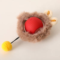 Placeholder: red rolling ball dog toy in tan plush cover with ears and yellow pom-pom tail