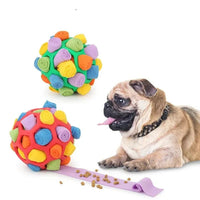 Placeholder: red and green snuffle ball toys with a pug and treats on an unrolled fleece strip
